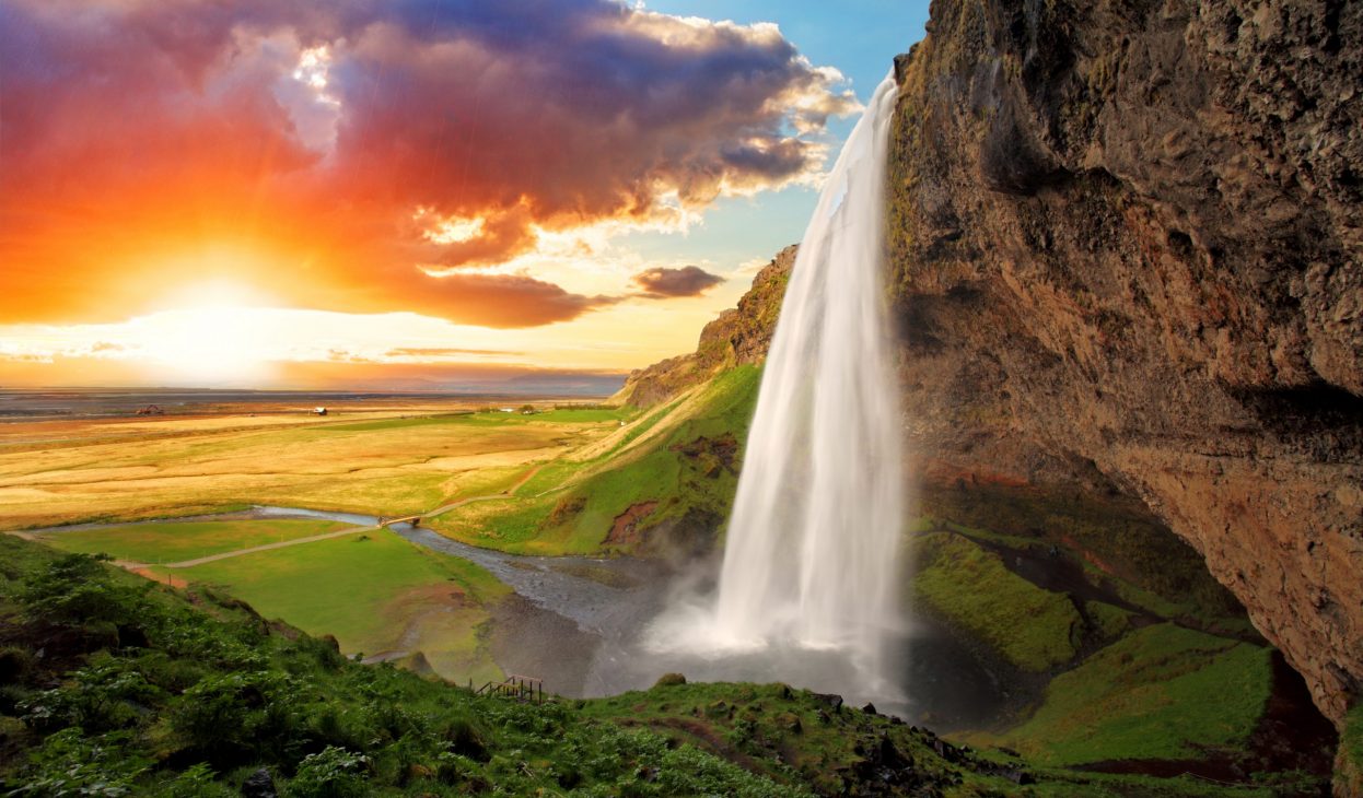 Seljalandsfoss is one of the most beautiful waterfalls on the Iceland. It is located on the South of the island. With a rainbow.